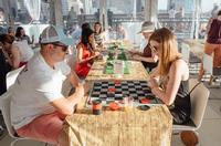 Leisure games, tasty bites, and music punctuate Ravens on the Rooftop every year.